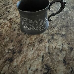 Engraved Silver Mug with Ornate Handle